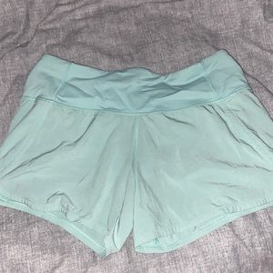 Lulu Lemon Speed Up shorts. Size 4 Tall. Mint Green